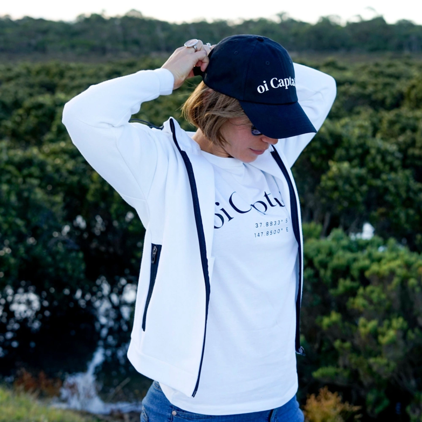 oi captain seascape womens hooded full zip jacket white la vita bella white tshirt front view outdoors.jpg