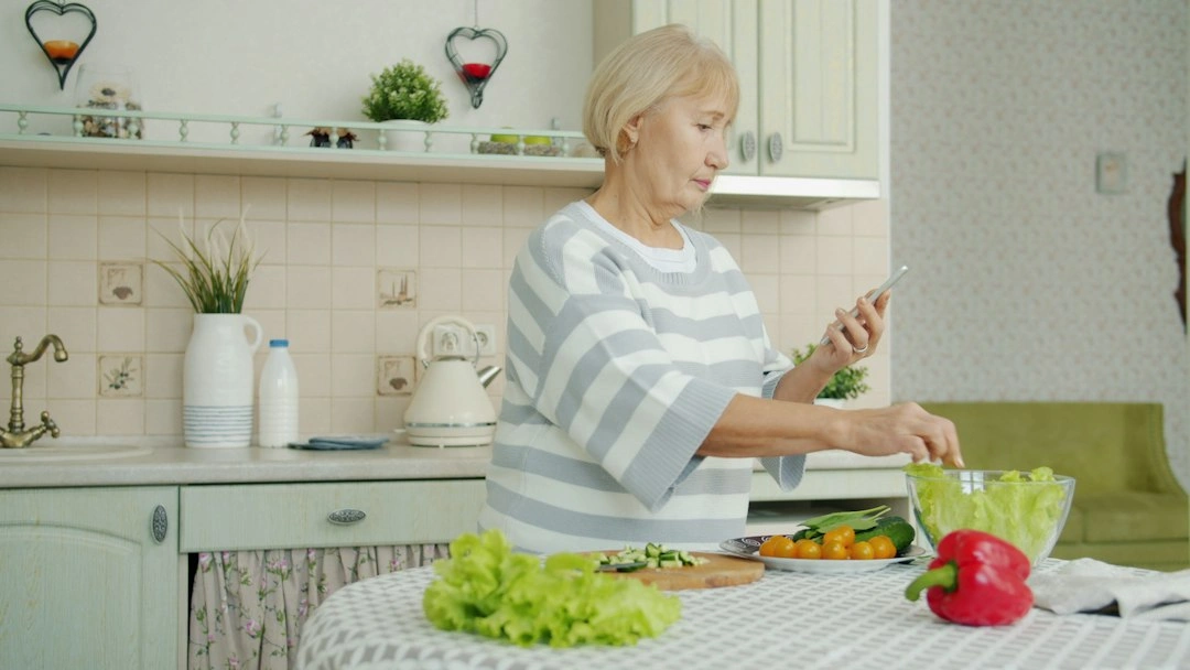 Older woman preparing a fresh meal at home