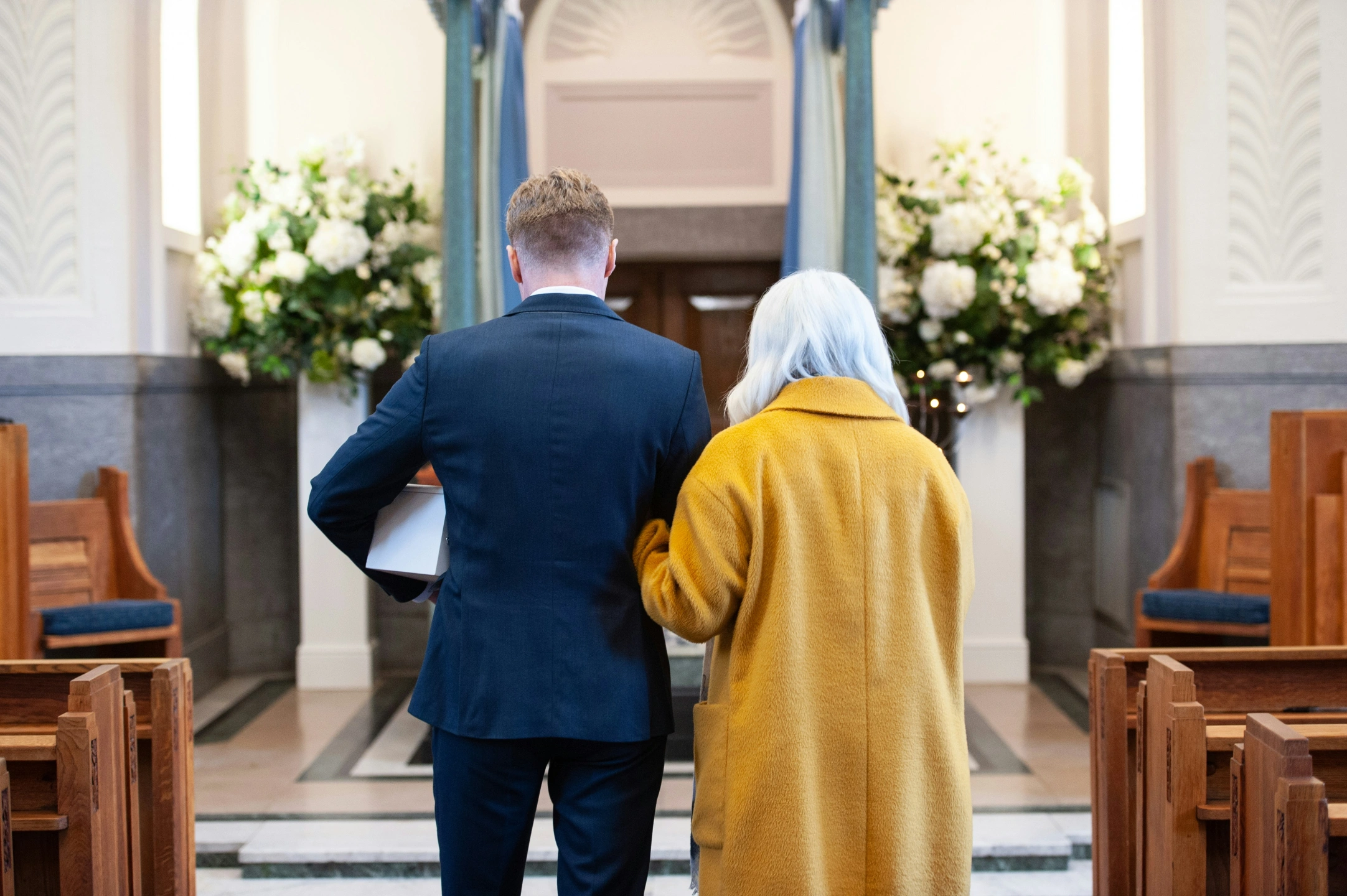 mother-and-son-at-funeral-service.jpg