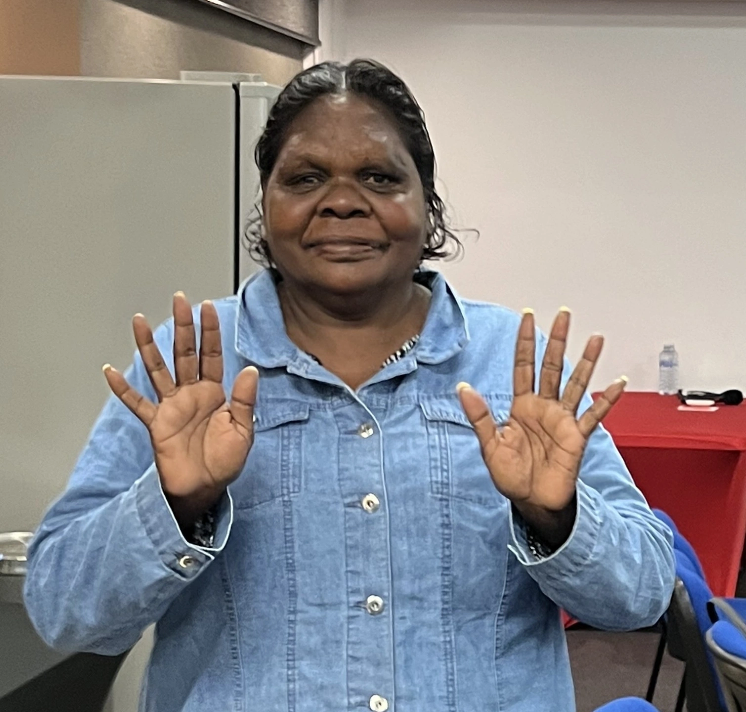 Stella with hands up small.jpg