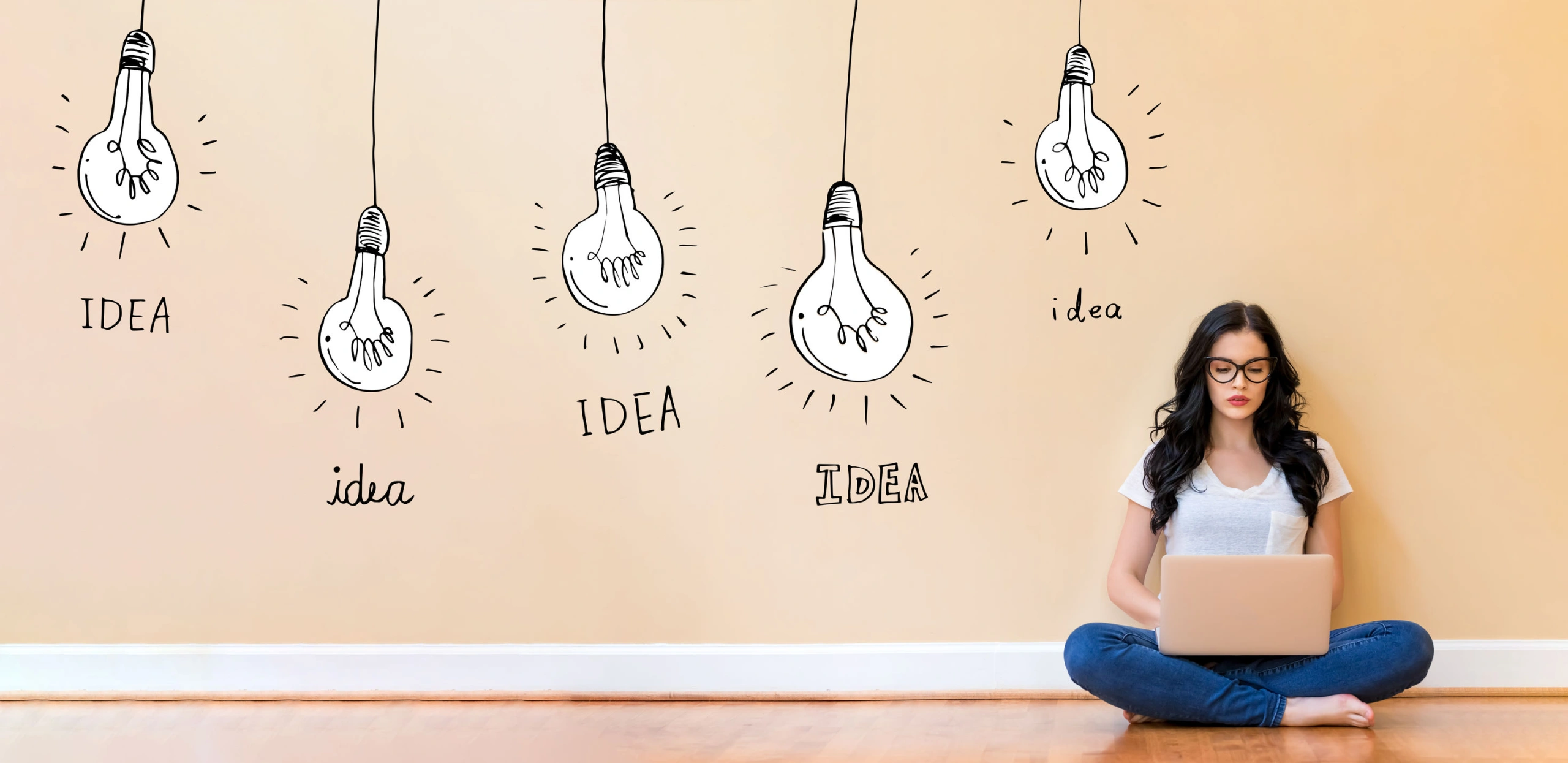 Woman ideas lightbulb wall.jpg