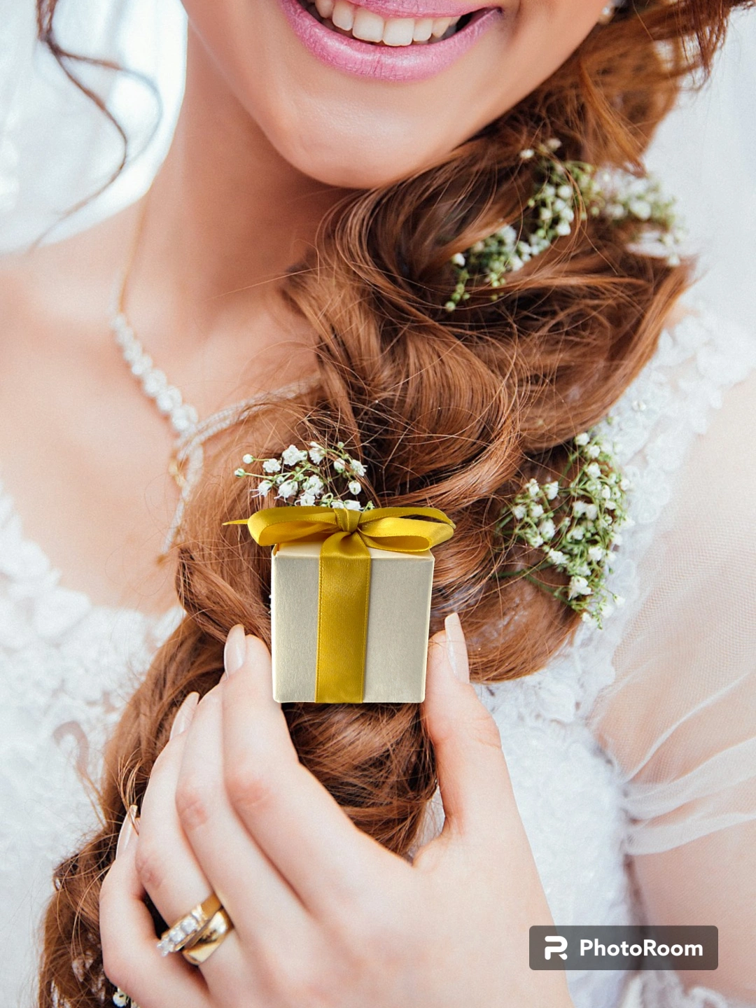 FB - Bride Holding Gift Box with Gold Ribbon.jpg
