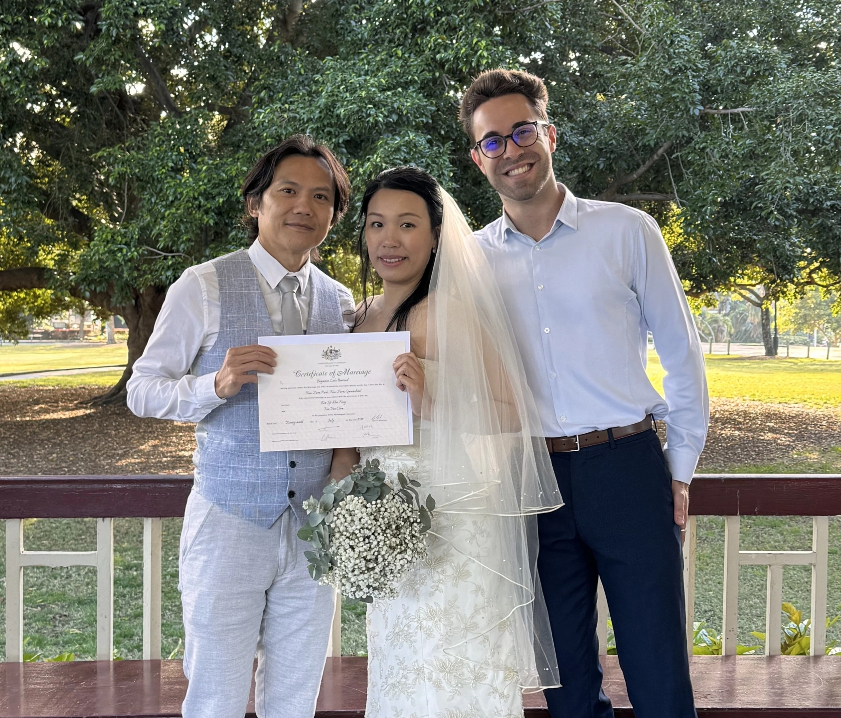 celebrant-with-happy-couple-in-park-landscape.jpg