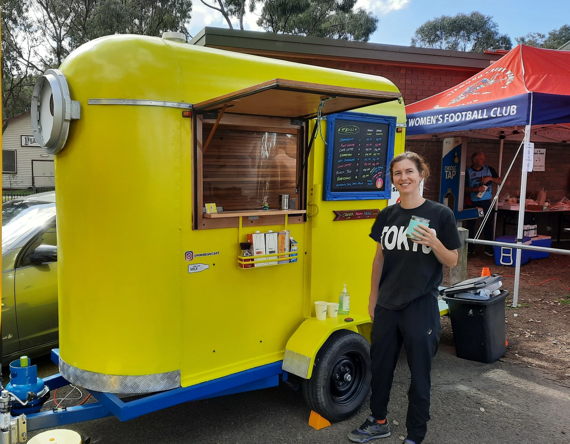 Barista serving at the cart