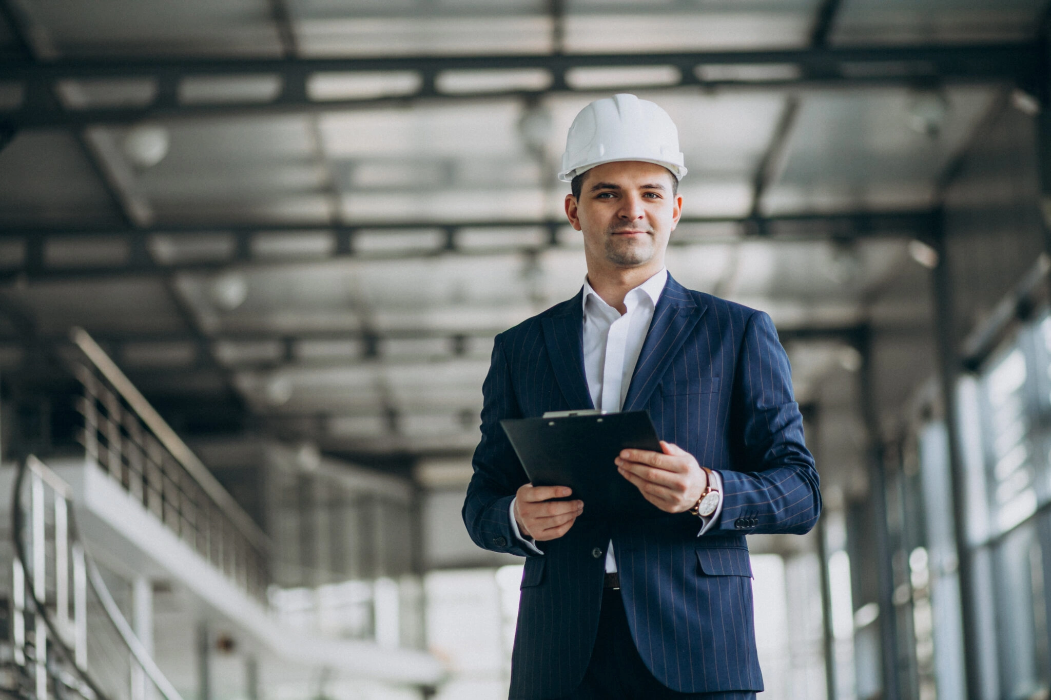 construction-project-manager-wearing-a-hard-hat-scaled.jpg