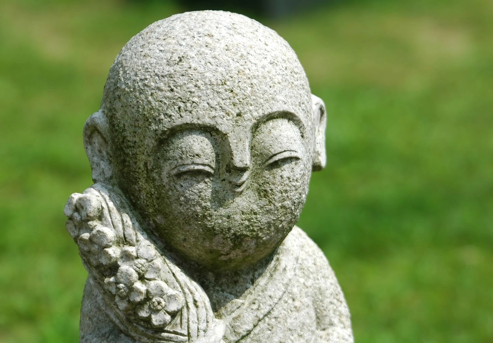 Smiling Jizo statue - symbol of compassion in Buddhist psychotherapy (2).jpg