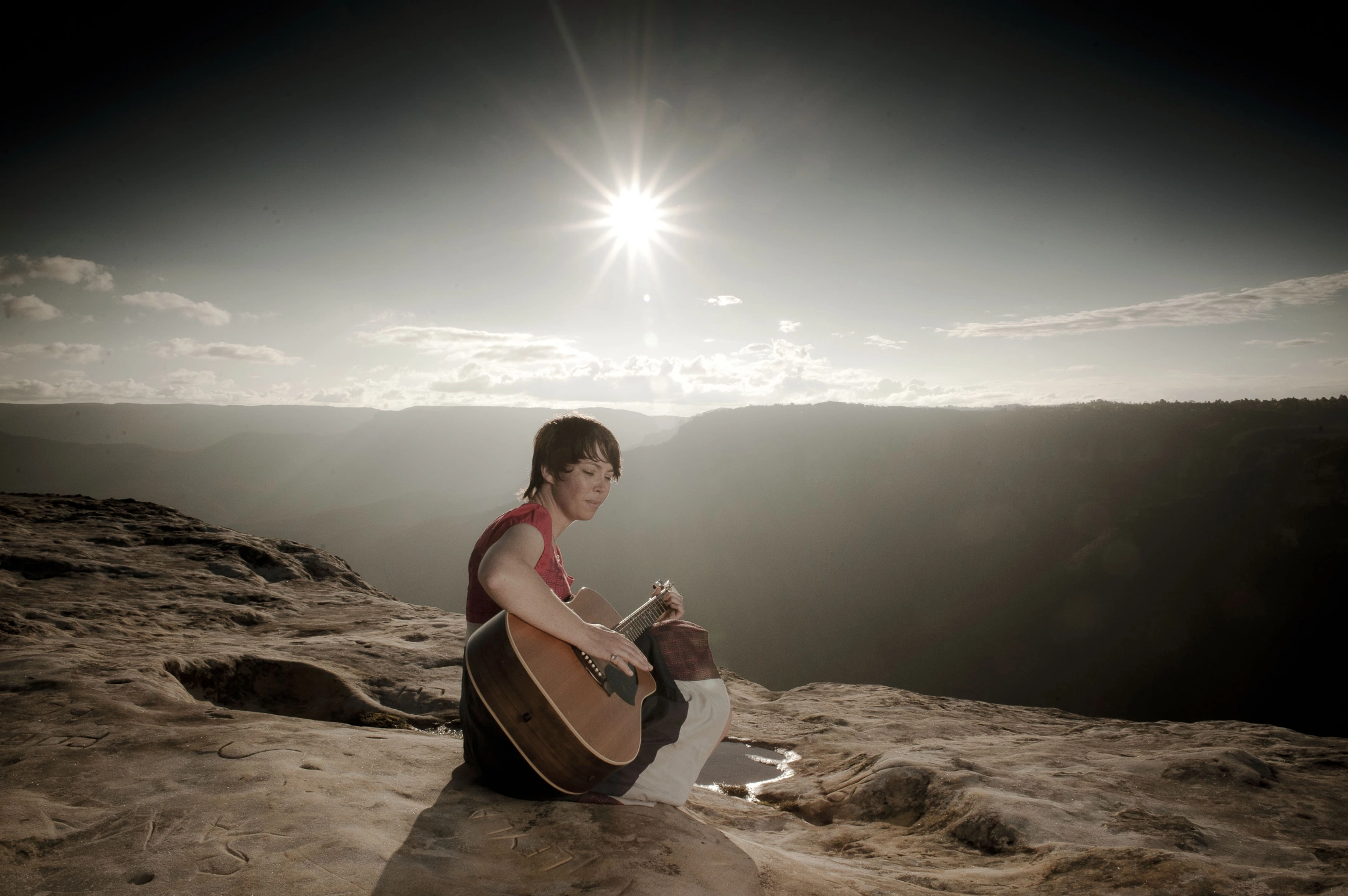 playing guitar on a cliff top.jpg