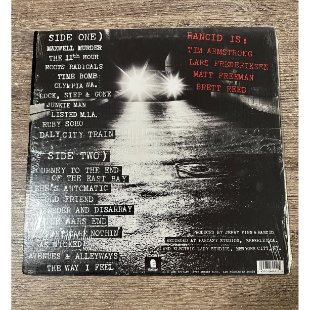 2-Rancid-And-Out-Comes-the-Wolves-back-cover.png