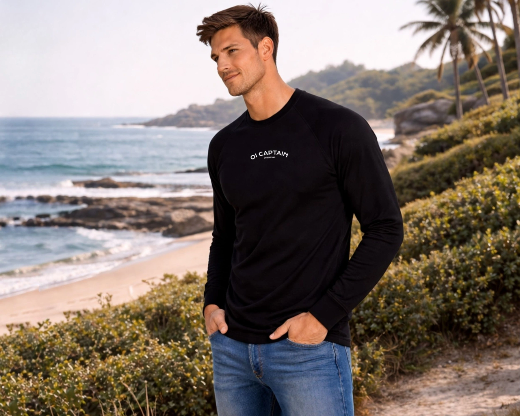 male model wearing oi captain the original long sleeve tshirt black front coastal lifestyle mens collection.jpg