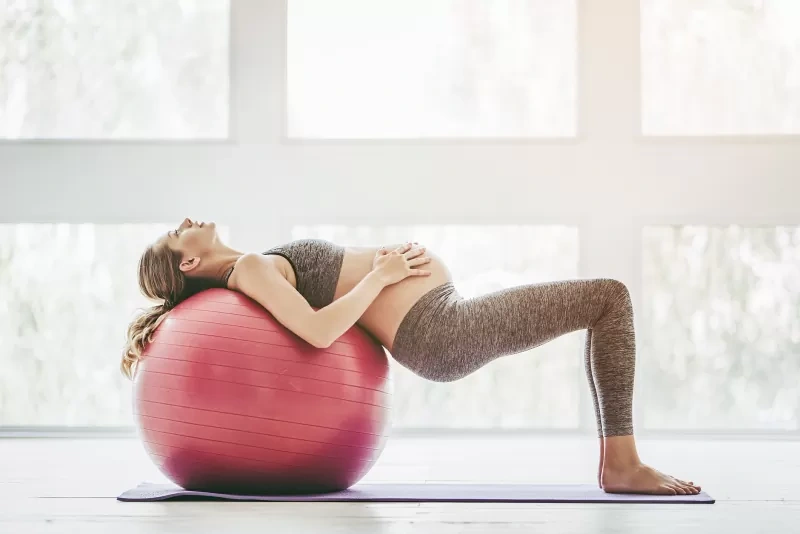 photo of pregnant women on ball.webp