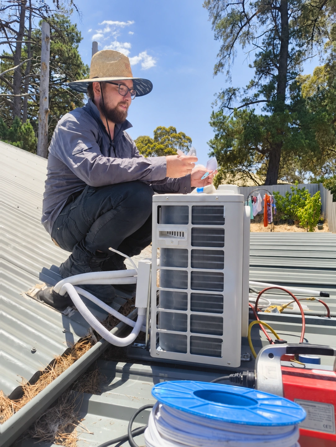 Rooftop HVAC Technician at Work.png