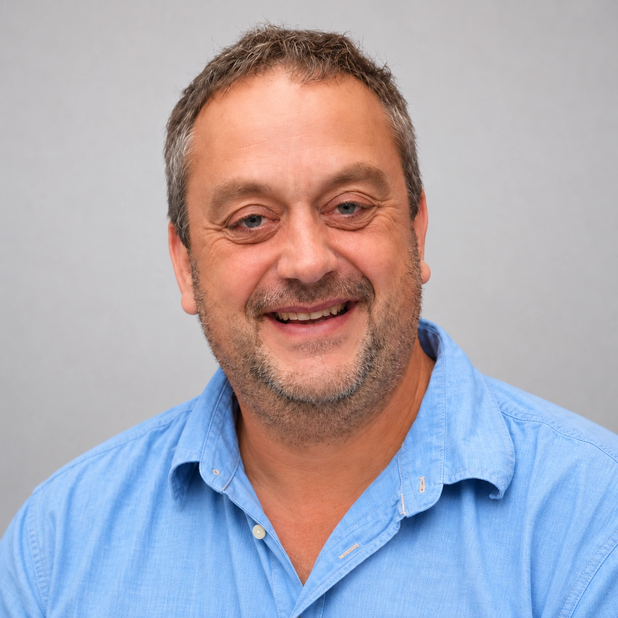 Friendly Middle-Aged Man Headshot.png