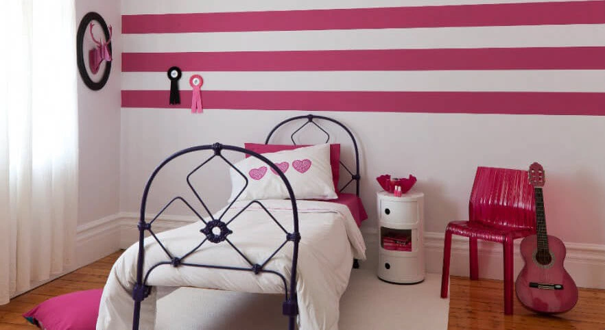pink horizontal stripes in kids room feature wall smaller.jpg