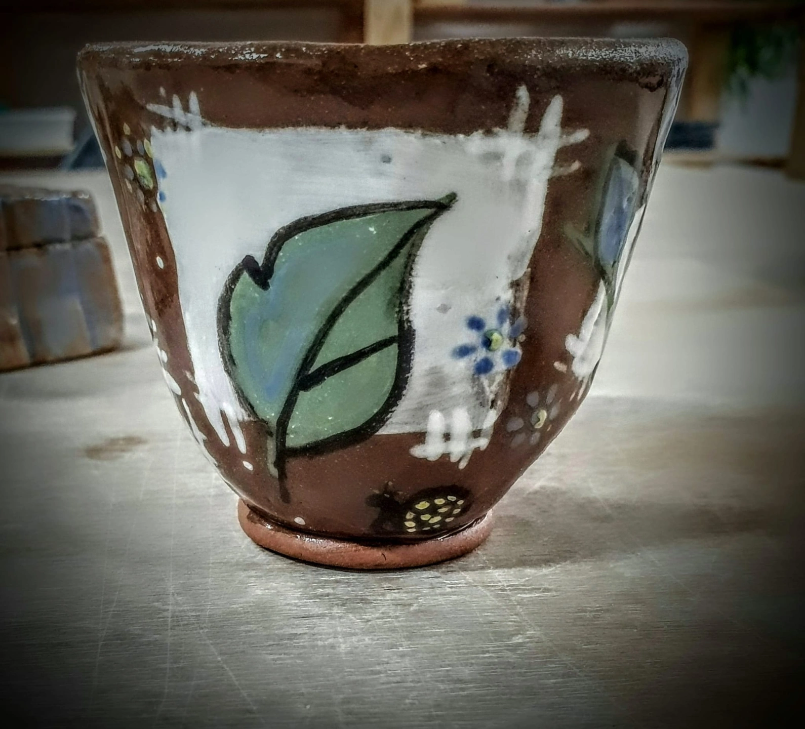 pinch cup with layered underglaze.jpg