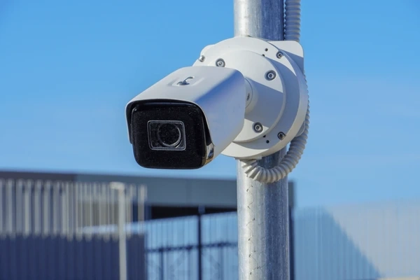white-cctv-camera-on-street-600nw-2499226743.webp