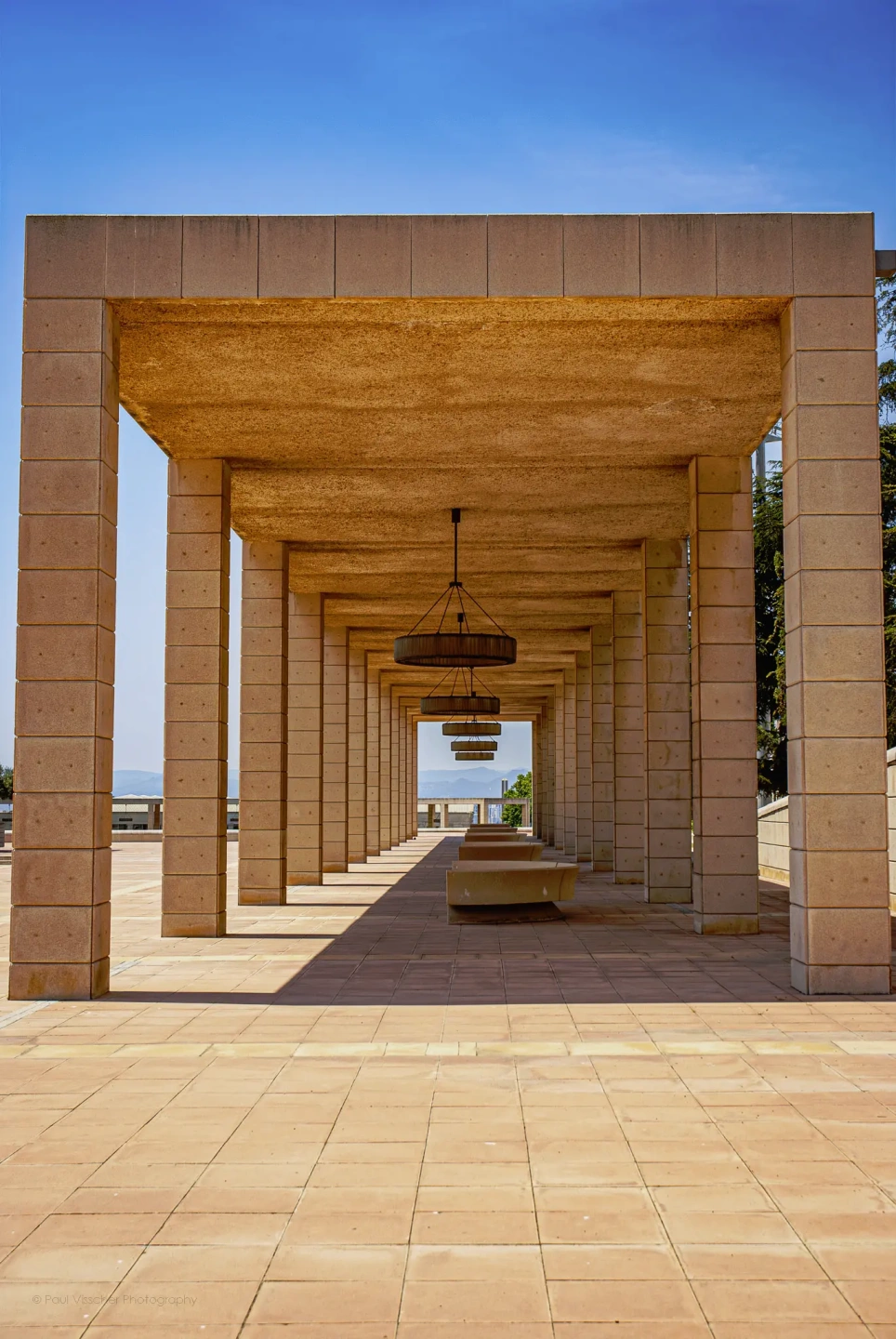 Stone Arcade Walkway at Palau Sant Jordi Esplanade.webp