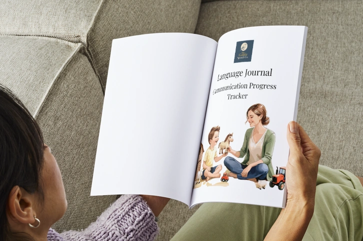 Language journal hands on couch inside title page.png
