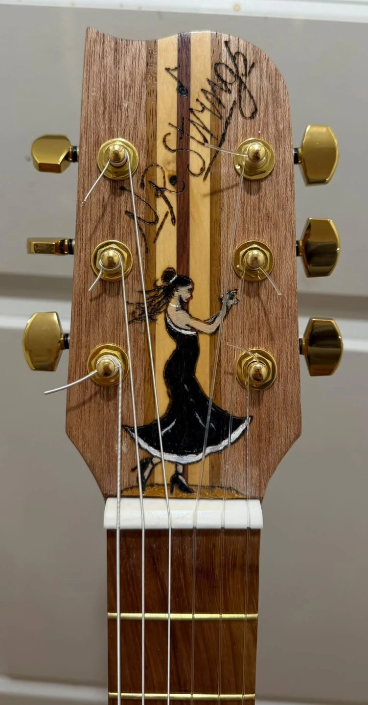 Odette Headstock.jpg