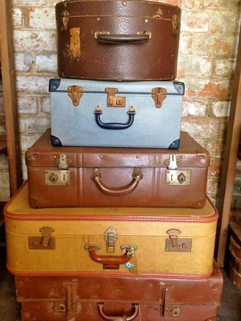 stack-of-brown-vintage-suitcases.jpg