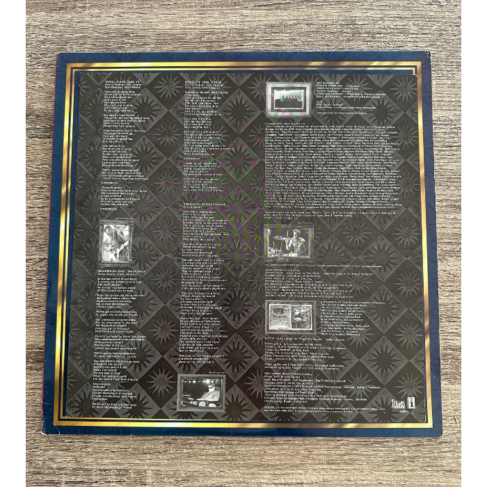 2-No-Doubt-Tragic-Kingdom-back-cover.png