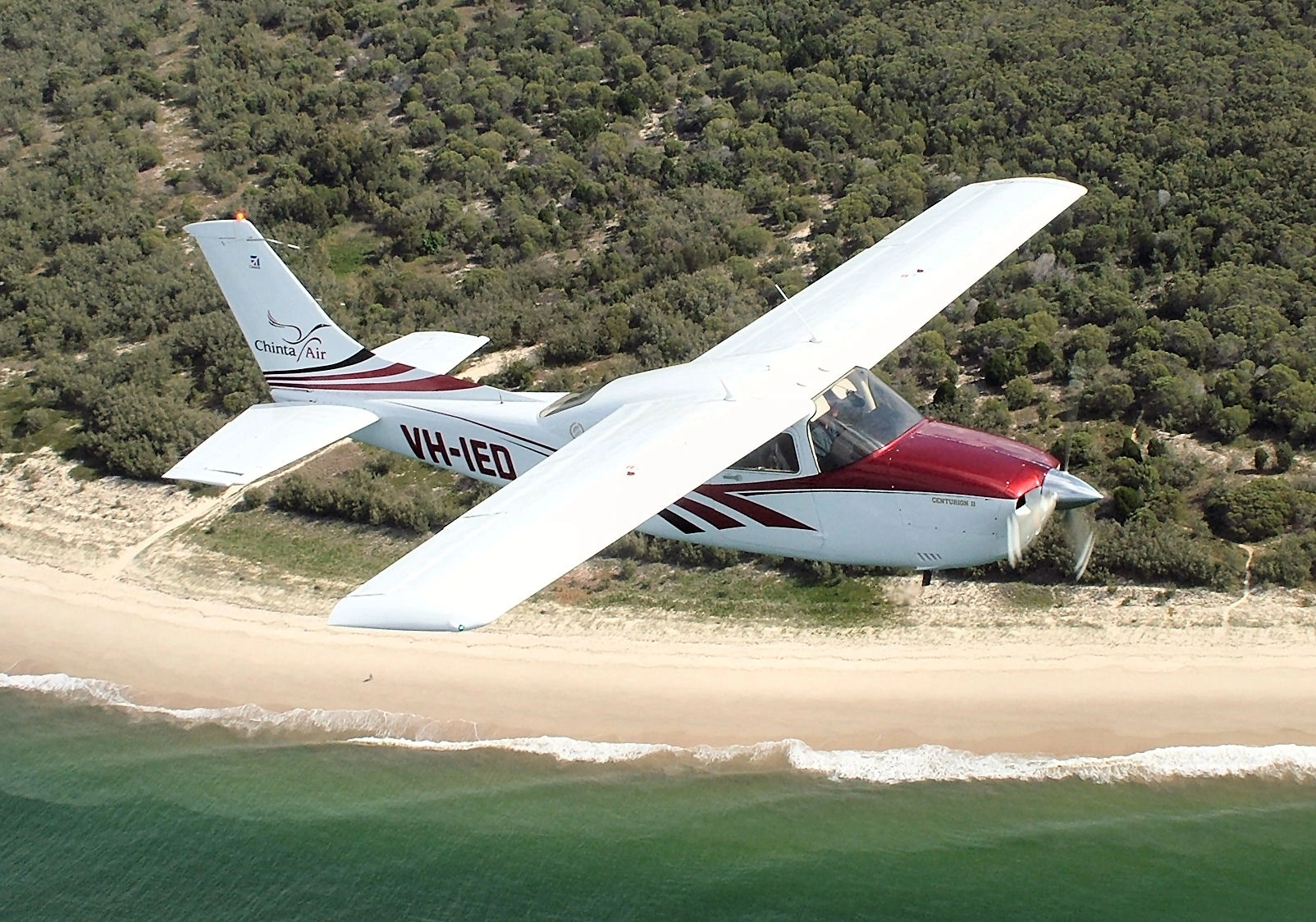 Ed in flight over beach.JPG
