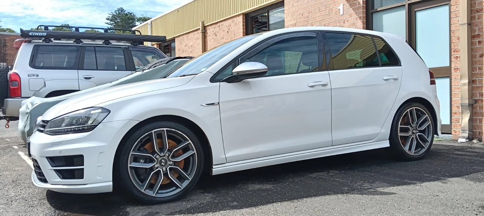 White Volkswagen Golf after mobile ceramic coating detail by Paint By Popz, Sydney Northern Beaches