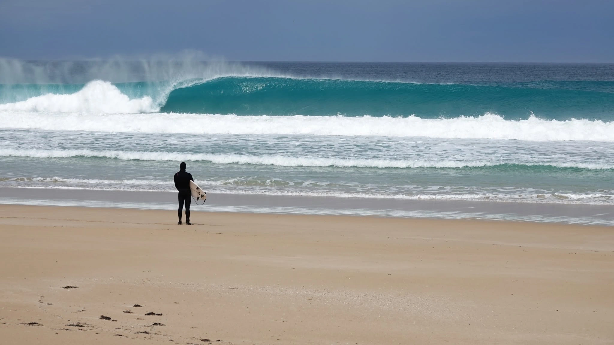Surfer overlooking waves.jpg