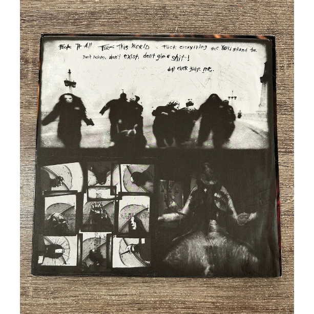 3-Slipknot-Slipknot-inner.png