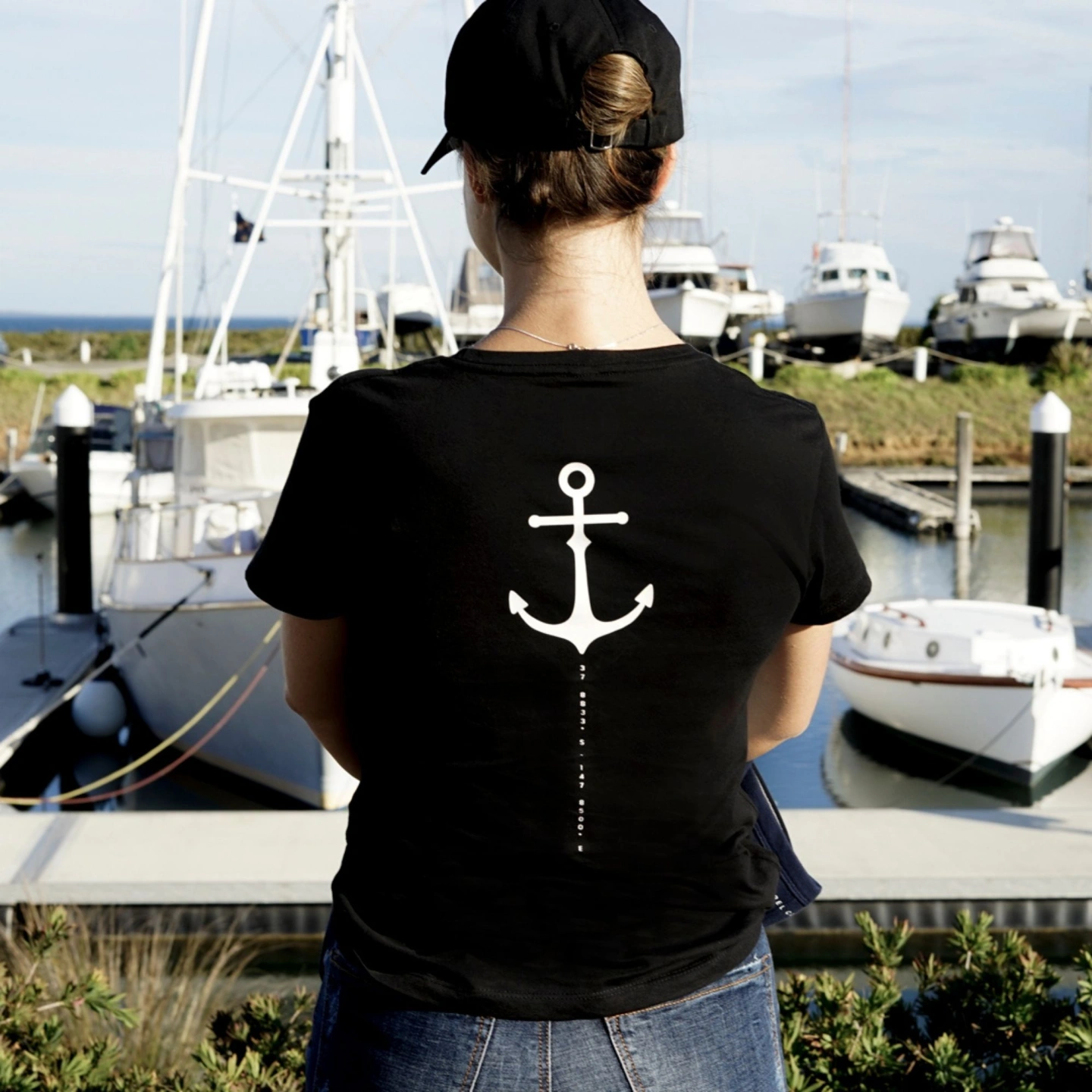 oi captain queen of hearts womens soft crew tee black back view featuring anchor design.jpg