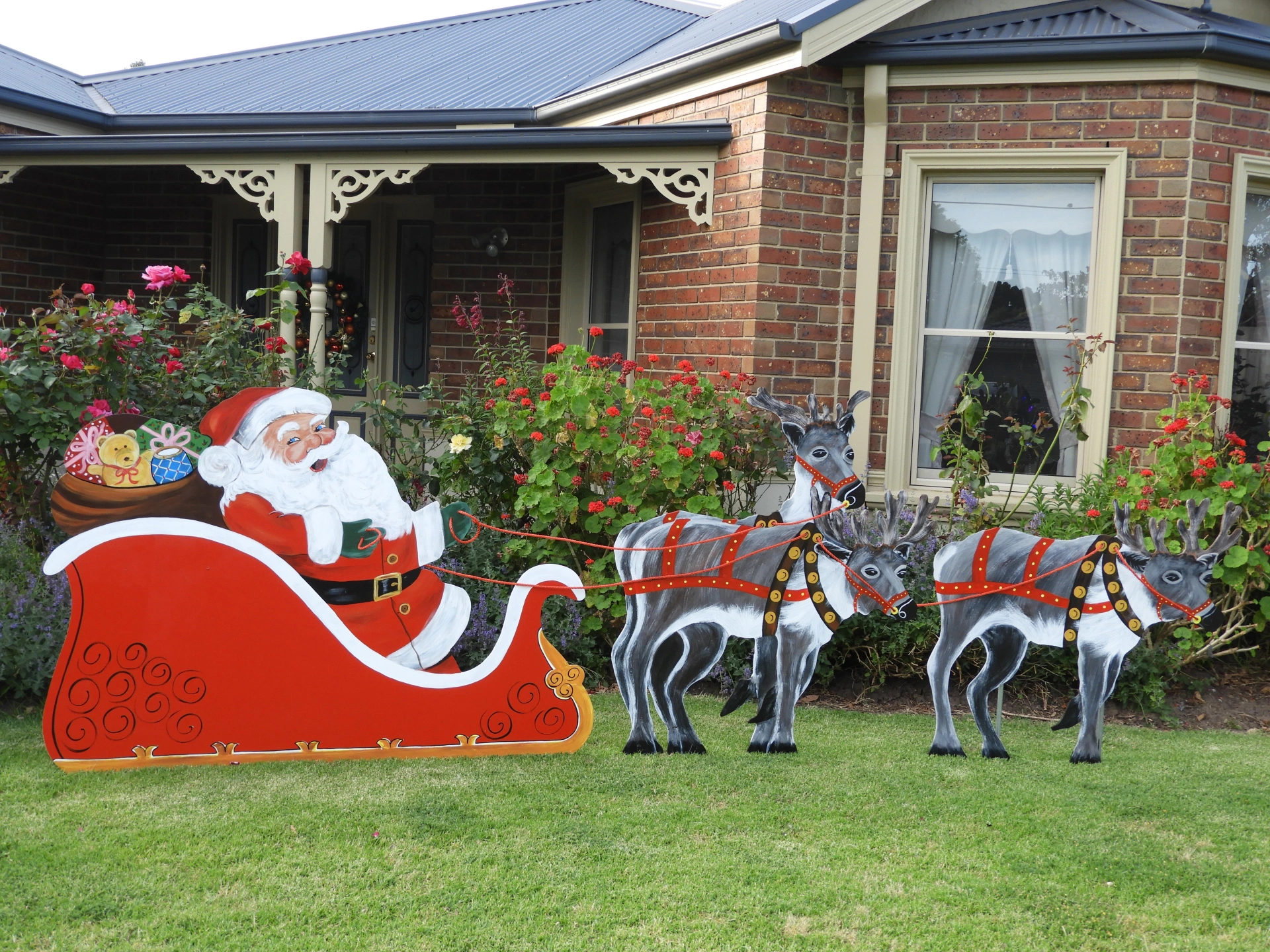 Santa in sleigh with 3 reindeers.JPG