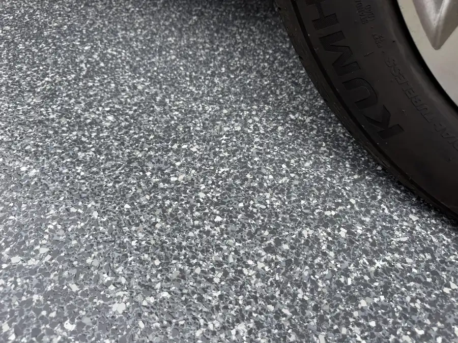gargoyle-flake-mid-grey-polyaspartic-tyre.webp