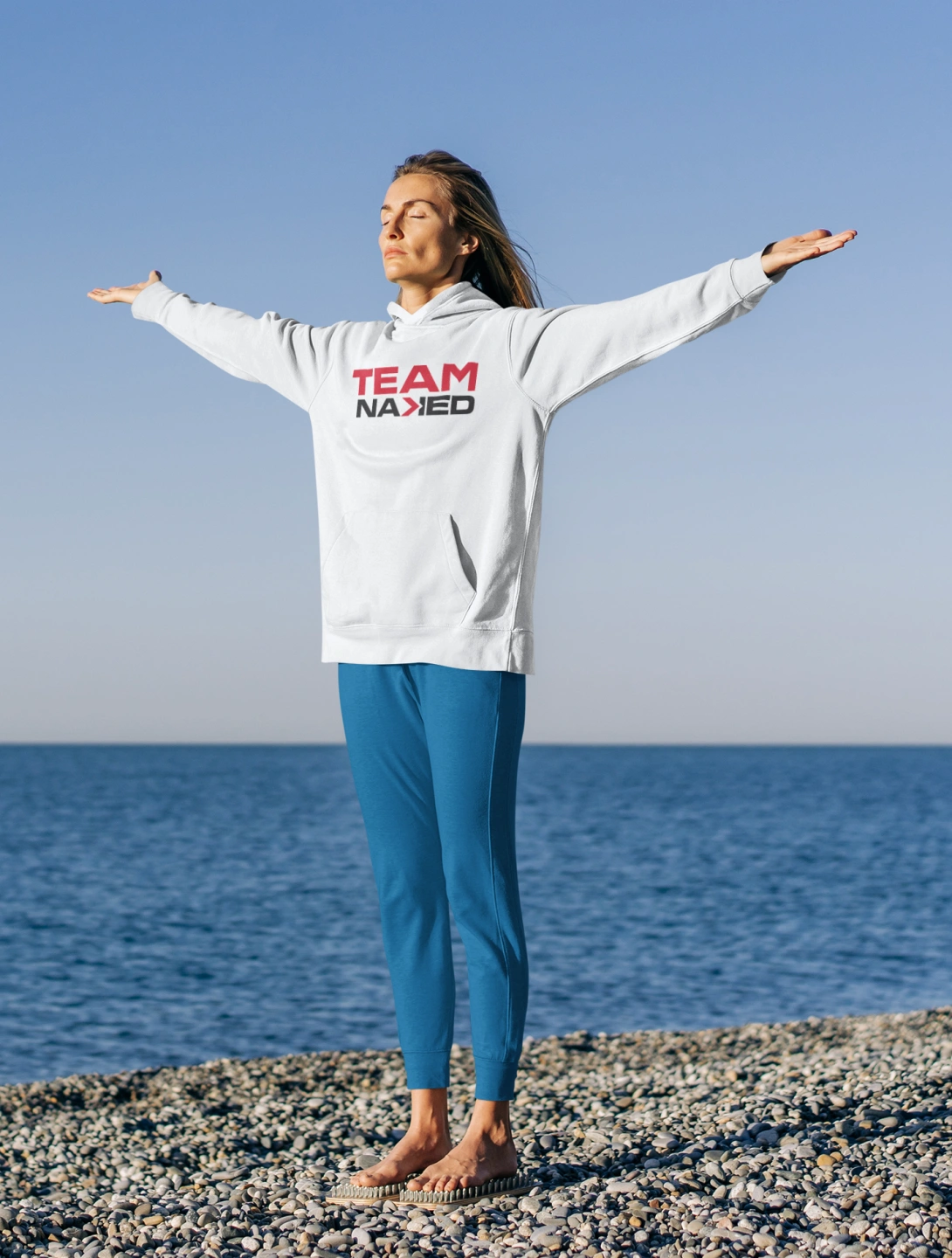pullover-hoodie-mockup-of-a-woman-doing-a-standing-meditation-by-the-ocean-m21022-r-el2.png