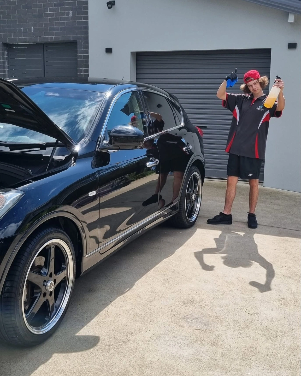 nas washing a car.JPG
