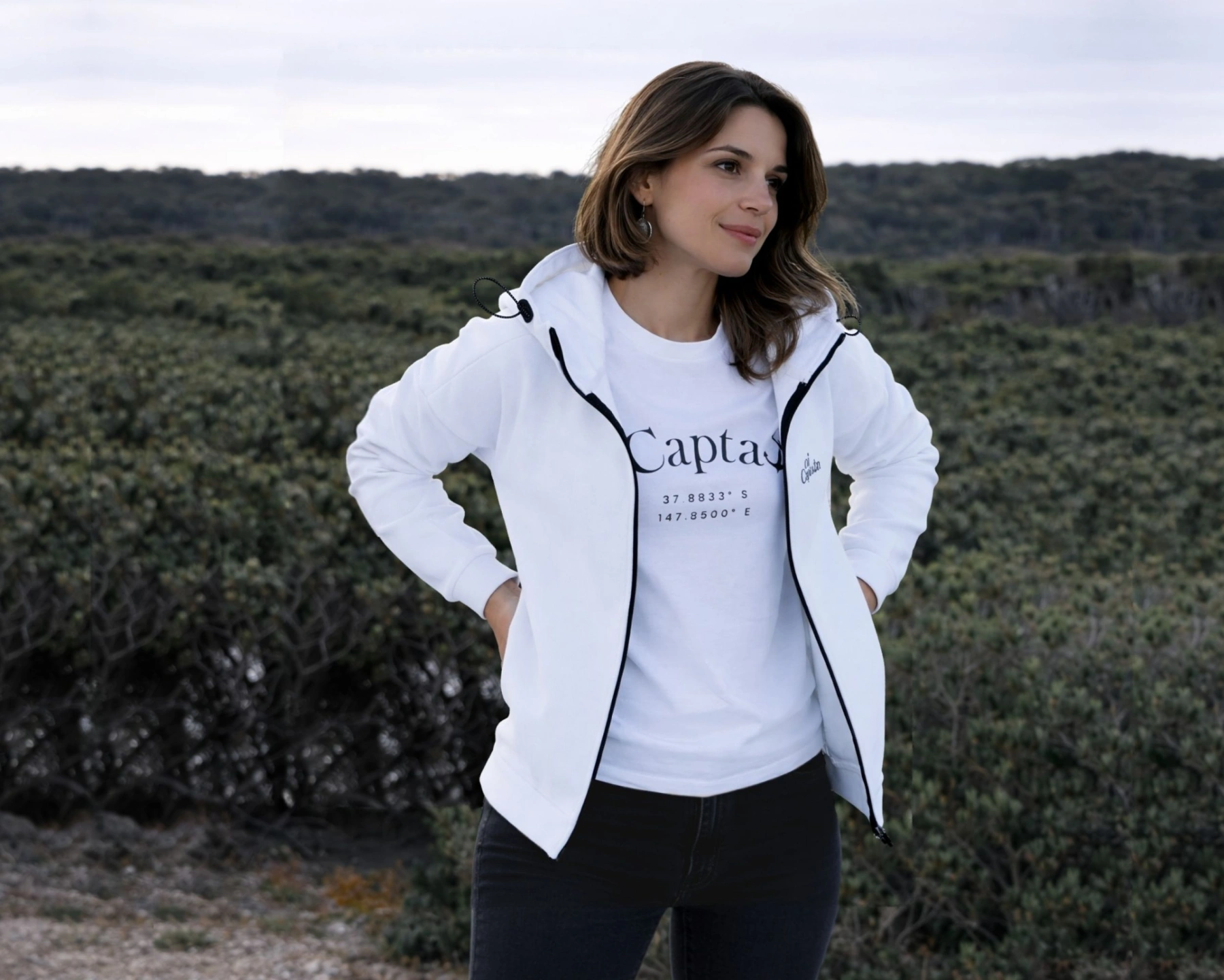 female model wearing oi captain seascape hoodie full zip white front view weekend vibes.jpg