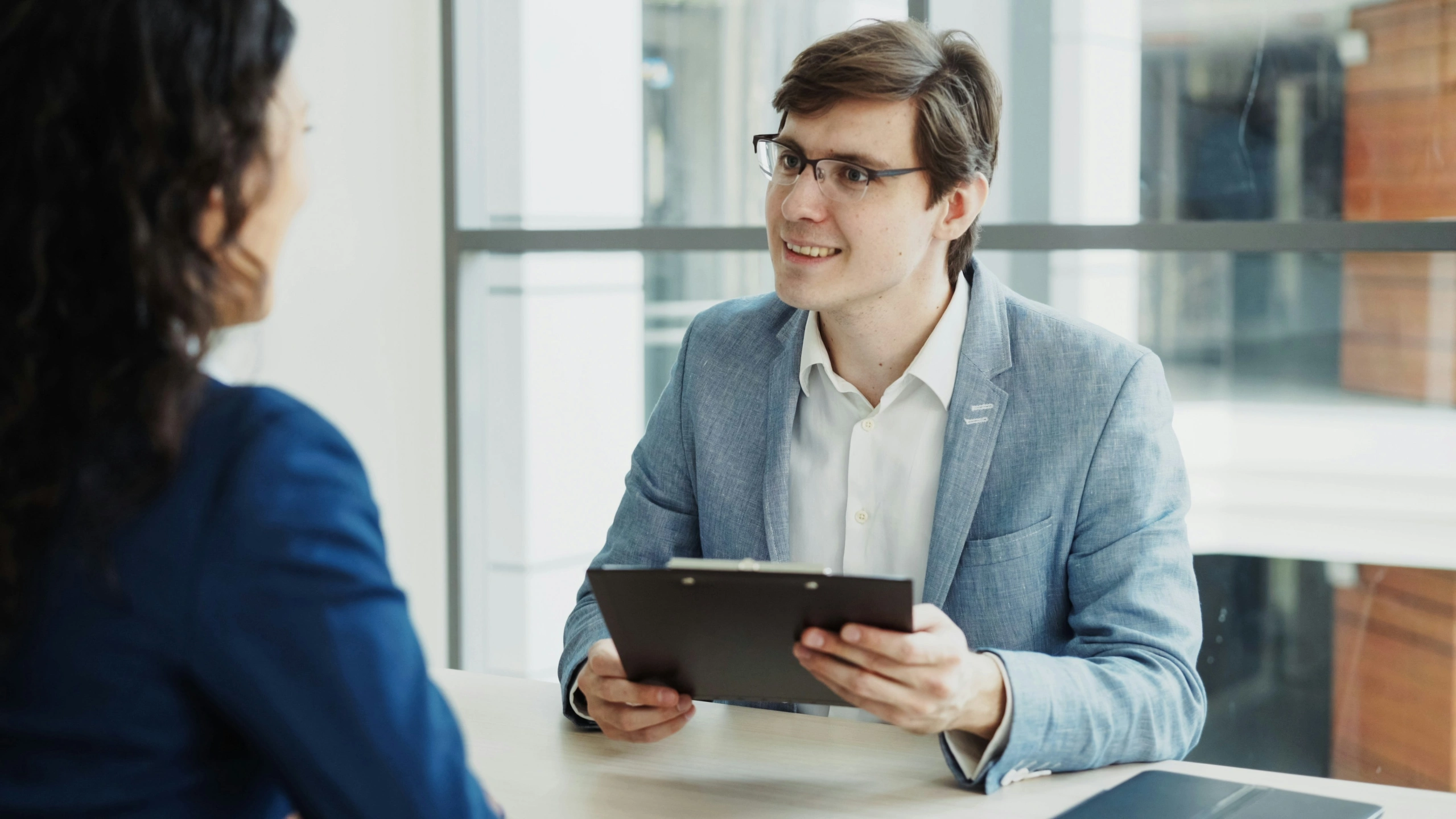 Recruiter conducting a candidate interview for a business.jpg