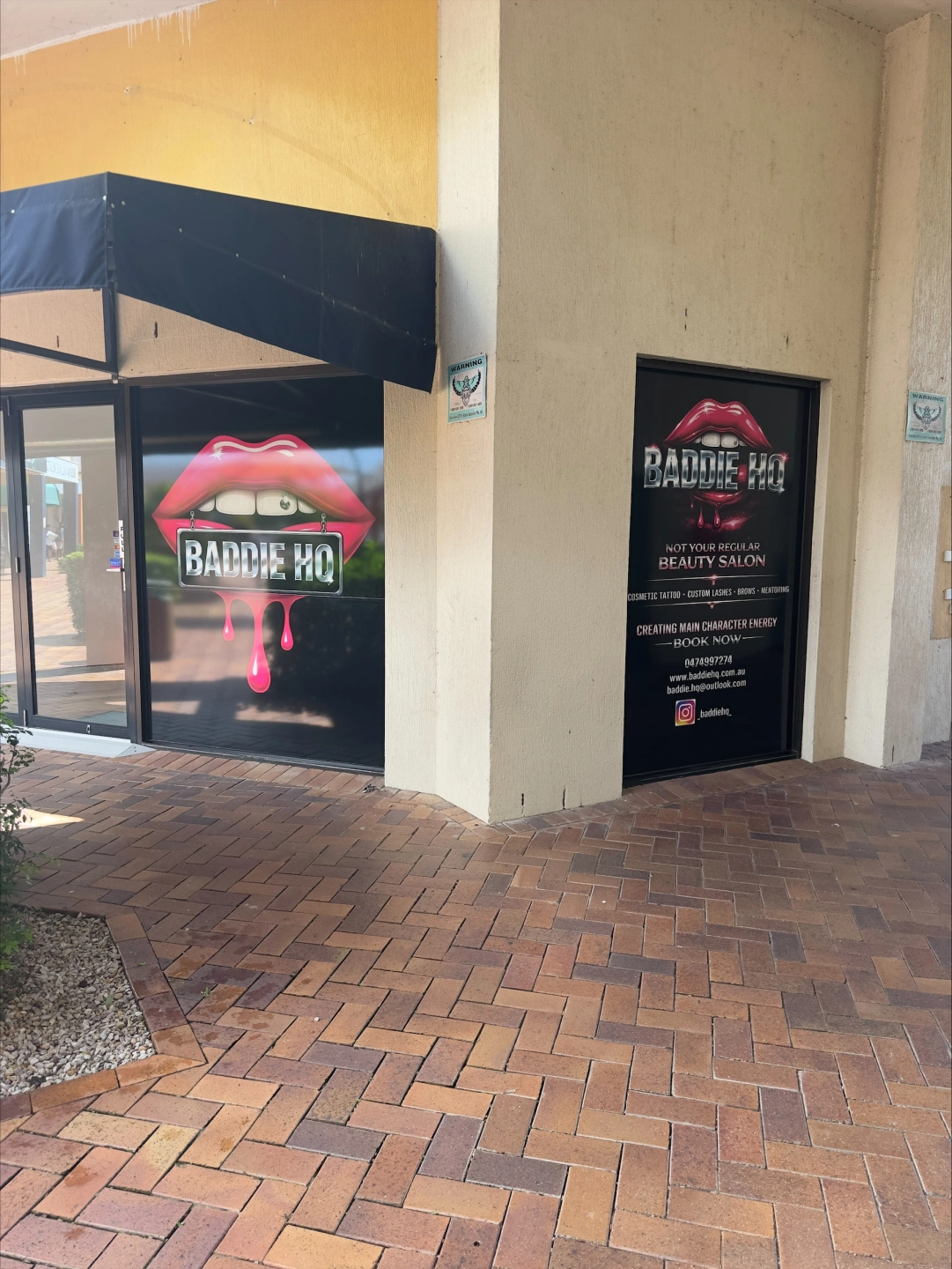 BADDIE HQ side signage view.jpeg