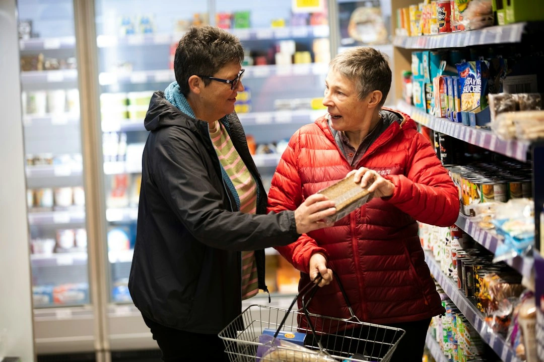 Support worker helping with grocery shopping