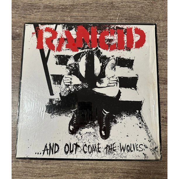1-Rancid-And-Out-Comes-the-Wolves-front-cover.png