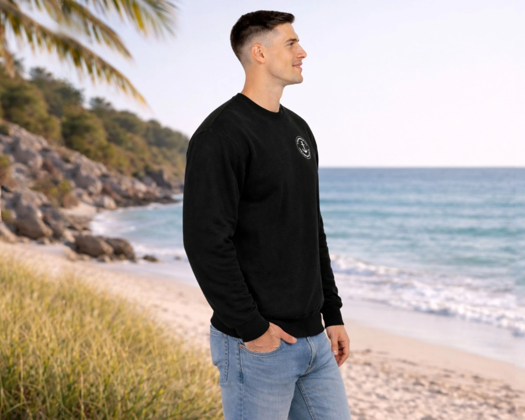 male model wearing oi captain copeland sweatshirt black side view coastal vibes.jpg