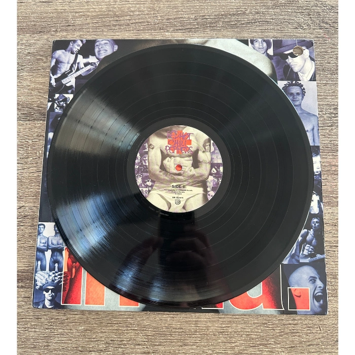 2-Red-Hot-Chilli-Peppers-Out-in-LA-record.png