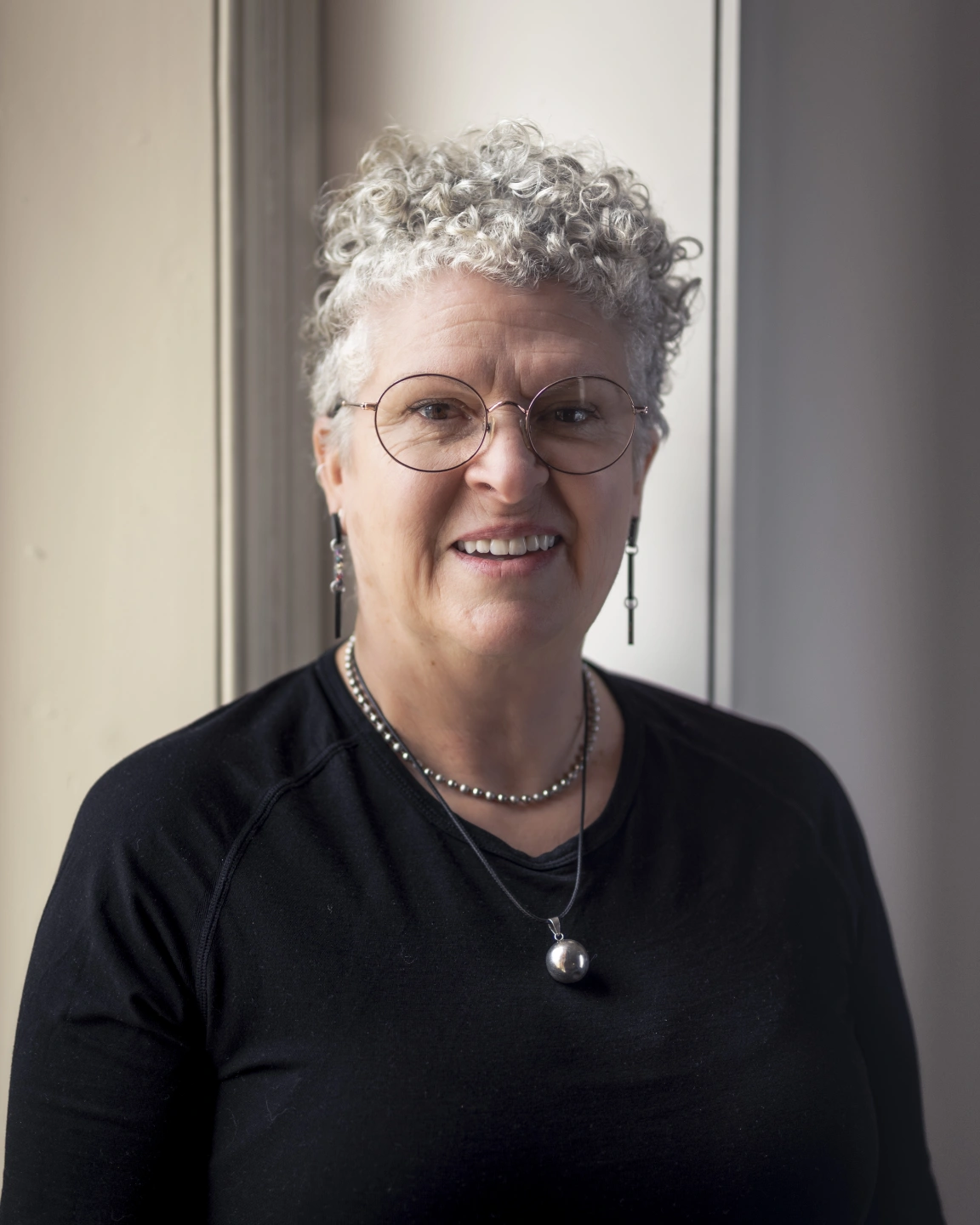 Mon New Headshot 2b-1.jpg
