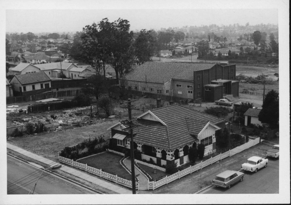 Photograph showing Mr Dale's residence on the corner of Flushcombe Road and Alpha Street. Also showing Masonic Temple prior to being demolished to make way for Kmart..jpg