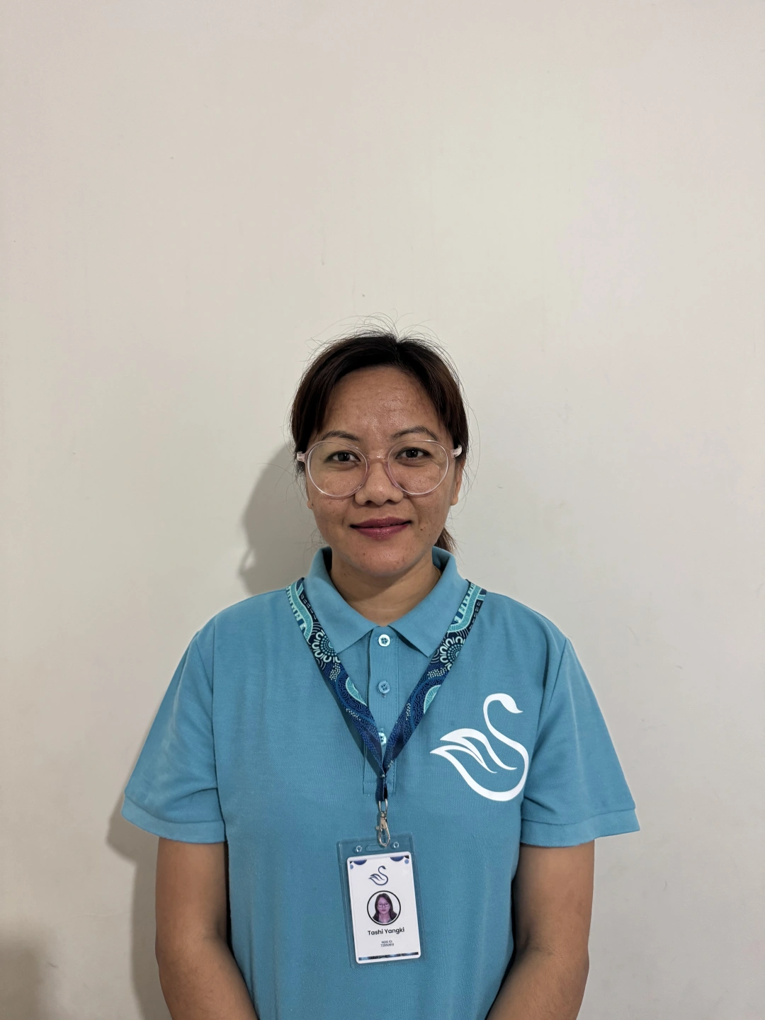 Tashi Work Profile Pic teal top.jpeg